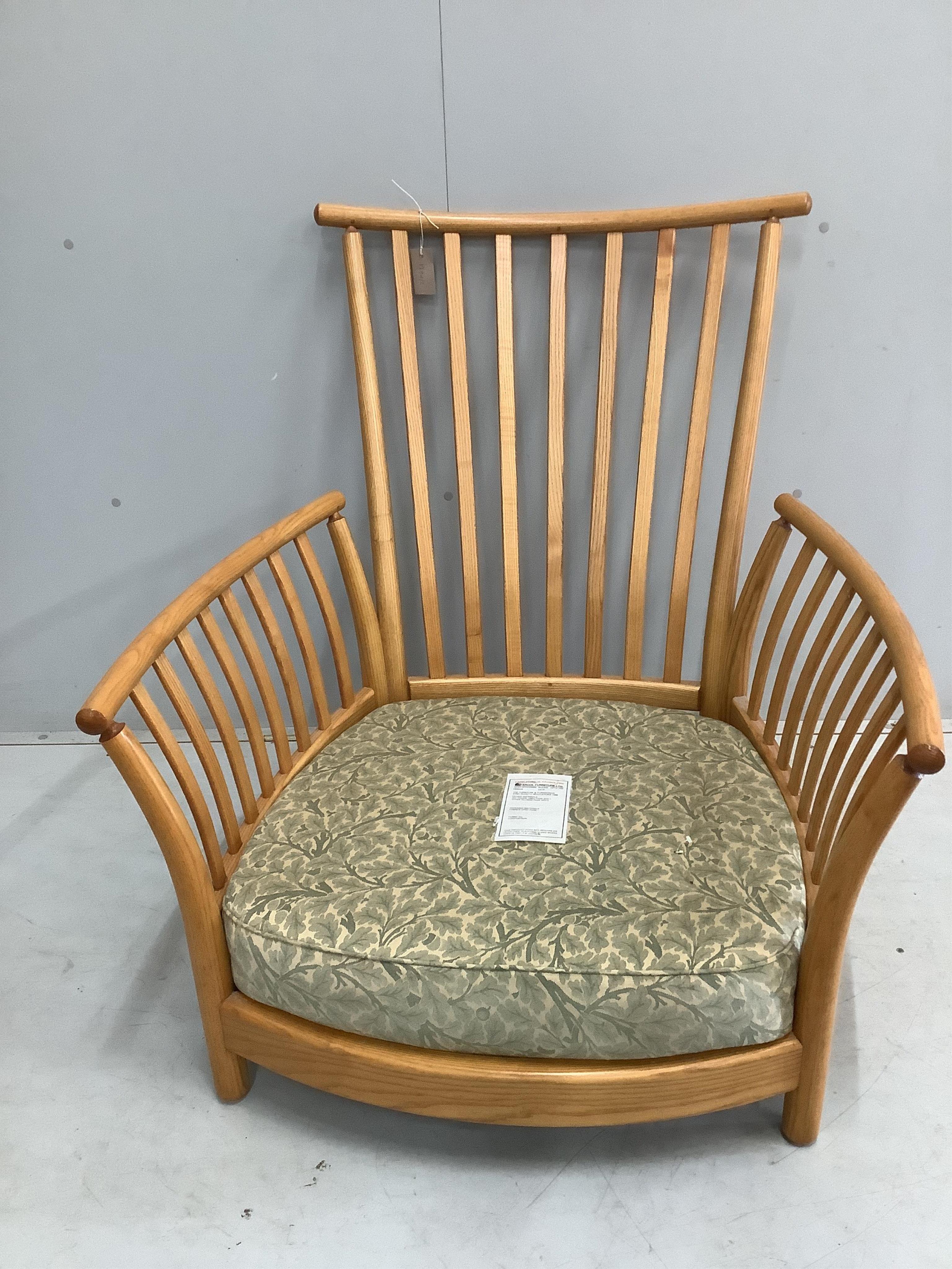 An Ercol ash Renaissance high back armchair, width 89cm, depth 90cm, height 98cm